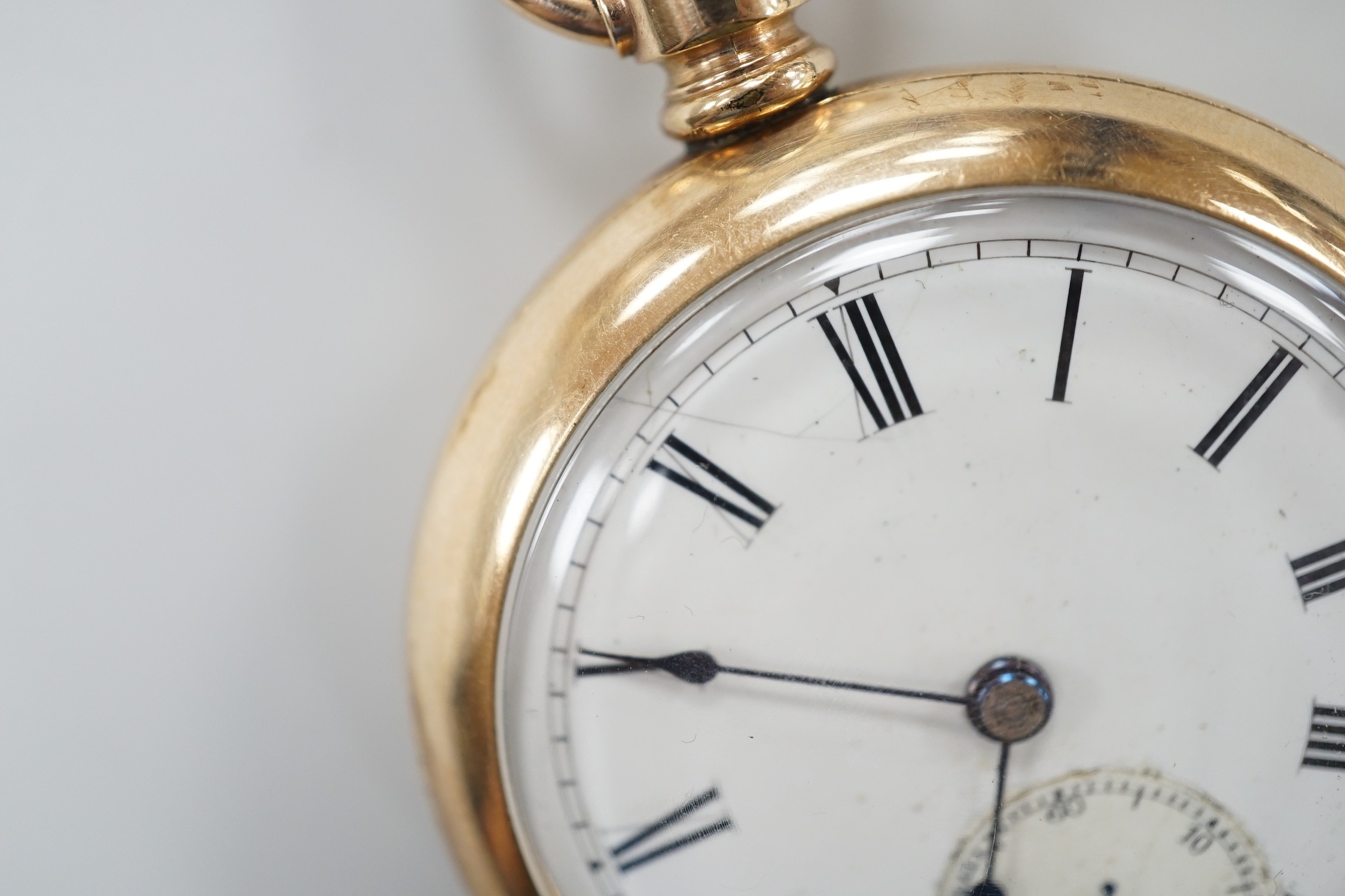 An American gold plated Rockford Watch Co. keyless open faced pocket watch, with Roman dial and subsidiary seconds, the case back engraved with a horse.